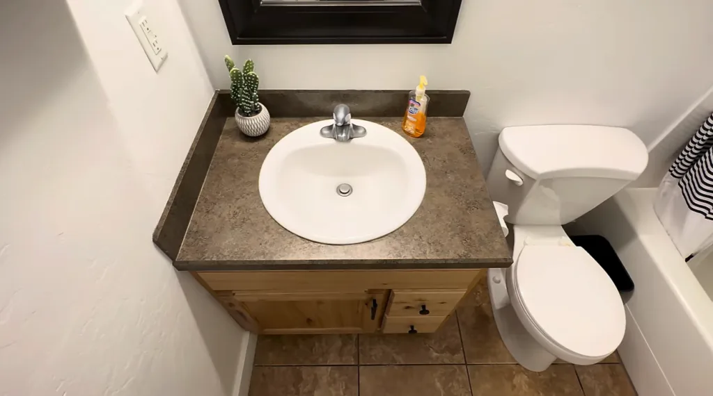 Bathroom vanity area before remodel in Richmond VA